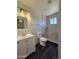 Updated bathroom with walk-in shower at 4649 S 17Th St, Phoenix, AZ 85040