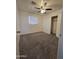 Spacious bedroom with carpet and ceiling fan at 4649 S 17Th St, Phoenix, AZ 85040