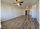 Bright living room with wood-look floors at 4649 S 17Th St, Phoenix, AZ 85040