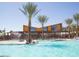 Resort-style pool with palm trees and misters at 4802 S Duffy --, Mesa, AZ 85212