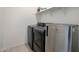 Laundry room with washer, dryer, and extra shelving at 4802 S Duffy --, Mesa, AZ 85212