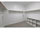 Large walk-in closet with ample shelving and storage at 4802 S Duffy --, Mesa, AZ 85212