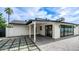 Back patio with covered porch, ceiling fan, and grass paver stones at 4916 E Kathleen Rd, Scottsdale, AZ 85254
