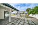 Inviting back patio with stylish pergola, outdoor kitchen, and lush greenery at 4916 E Kathleen Rd, Scottsdale, AZ 85254
