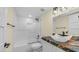 Bathroom featuring granite countertop sink, tub, shower, and updated fixtures at 4916 E Kathleen Rd, Scottsdale, AZ 85254