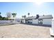 Modern home exterior, showcasing large windows and patio at 4916 E Kathleen Rd, Scottsdale, AZ 85254