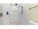 Modern shower with white subway tile, niche, glass enclosure, and black hardware at 4916 E Kathleen Rd, Scottsdale, AZ 85254