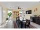 Casual dining area with a large table and built-in shelving at 4933 W Melody Ln, Laveen, AZ 85339