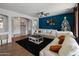 Bright living room with hardwood floors and a neutral color palette at 4933 W Melody Ln, Laveen, AZ 85339