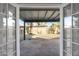 View of backyard patio through kitchen window at 5344 W Desert Hills Dr, Glendale, AZ 85304