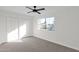 Bright bedroom with carpet, ceiling fan and window at 5344 W Desert Hills Dr, Glendale, AZ 85304