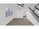 Dining room with hardwood floors and a ceiling fan at 5344 W Desert Hills Dr, Glendale, AZ 85304