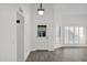 Entryway with a charming white door and hardwood floors at 5344 W Desert Hills Dr, Glendale, AZ 85304