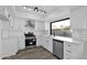 Modern kitchen featuring white shaker cabinets and stainless steel appliances at 5344 W Desert Hills Dr, Glendale, AZ 85304