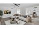 Living room featuring L-shaped sofa and stylish coffee table at 5344 W Desert Hills Dr, Glendale, AZ 85304