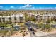 Aerial view of community with resort in background at 5350 E Deer Valley Dr # 1418, Phoenix, AZ 85054