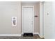 Bright entryway with a white door and a welcome mat at 5350 E Deer Valley Dr # 1418, Phoenix, AZ 85054