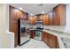 Modern kitchen with stainless steel appliances and granite countertops at 5350 E Deer Valley Dr # 1418, Phoenix, AZ 85054