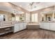 Elegant Primary bathroom with double vanity, soaking tub, and mosaic tile at 5429 E Barwick Dr, Cave Creek, AZ 85331