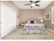 Bedroom with floral bedding, nightstand and window at 5429 E Barwick Dr, Cave Creek, AZ 85331