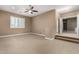 Bedroom with ceiling fan and window at 5429 E Barwick Dr, Cave Creek, AZ 85331