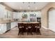 Kitchen with island, stainless steel appliances, and white cabinets at 5429 E Barwick Dr, Cave Creek, AZ 85331