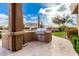 Outdoor kitchen with built-in grill and expansive countertop at 5429 E Barwick Dr, Cave Creek, AZ 85331