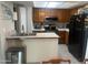 Well-equipped kitchen with ample cabinetry and modern appliances at 5813 N 59Th Dr, Glendale, AZ 85301