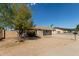 House exterior with tree and driveway at 5934 W Coronado Rd, Phoenix, AZ 85035