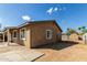 Side view of house with shed and yard at 5934 W Coronado Rd, Phoenix, AZ 85035