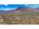 Aerial view of a sprawling community nestled in the mountains at 6033 E Pebbles Ct, Cave Creek, AZ 85331