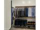 Large walk-in closet with ample hanging space and shelving at 6033 E Pebbles Ct, Cave Creek, AZ 85331