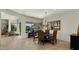 Charming dining room with dark wood furniture and chandelier at 6033 E Pebbles Ct, Cave Creek, AZ 85331