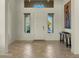 Bright entryway with tile floors and large windows at 6033 E Pebbles Ct, Cave Creek, AZ 85331