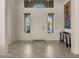 Bright entryway with tile floors and large artwork at 6033 E Pebbles Ct, Cave Creek, AZ 85331