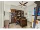 Home office with built-in wood desk and shelving at 6033 E Pebbles Ct, Cave Creek, AZ 85331