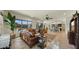 Spacious living room featuring leather furniture and open floor plan at 6033 E Pebbles Ct, Cave Creek, AZ 85331