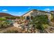 Fire pit and seating area near the pool at 6033 E Pebbles Ct, Cave Creek, AZ 85331