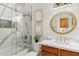 Bathroom with marble shower, vanity, and gold fixtures at 6231 E Mark Way # 32, Cave Creek, AZ 85331