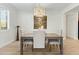 Light and airy dining room with a wood table and four chairs at 6231 E Mark Way # 32, Cave Creek, AZ 85331