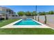 Clean lines and refreshing turquoise in this modern backyard pool at 630 W Echo Ln, Phoenix, AZ 85021