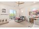 Bright bedroom featuring a private balcony and a workspace at 630 W Echo Ln, Phoenix, AZ 85021