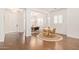 Bright dining area with hardwood floors and round table at 630 W Echo Ln, Phoenix, AZ 85021