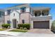 Two-story home with brick accents and a landscaped front yard at 630 W Echo Ln, Phoenix, AZ 85021