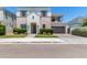 Two-story home with brick accents and a landscaped front yard at 630 W Echo Ln, Phoenix, AZ 85021