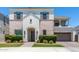 Two-story house with brick accents, two-car garage, and landscaping at 630 W Echo Ln, Phoenix, AZ 85021