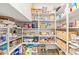 Well-organized pantry with plenty of shelving for storage at 630 W Echo Ln, Phoenix, AZ 85021