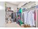 Large walk-in closet with ample shelving and hanging space at 630 W Echo Ln, Phoenix, AZ 85021