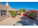 Landscaped backyard with gravel and bougainvillea at 6425 N 79Th St, Scottsdale, AZ 85250