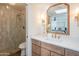 Updated bathroom features a walk-in shower, modern vanity, and stylish fixtures at 6425 N 79Th St, Scottsdale, AZ 85250